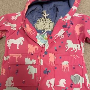 Brand new with tags Hatley color changing raincoat in size 9-12 months